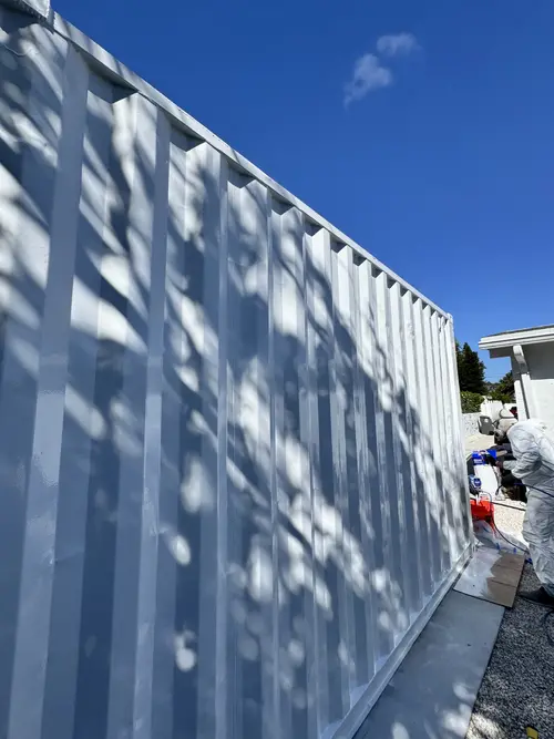 Shipping container coated with AMP-UP